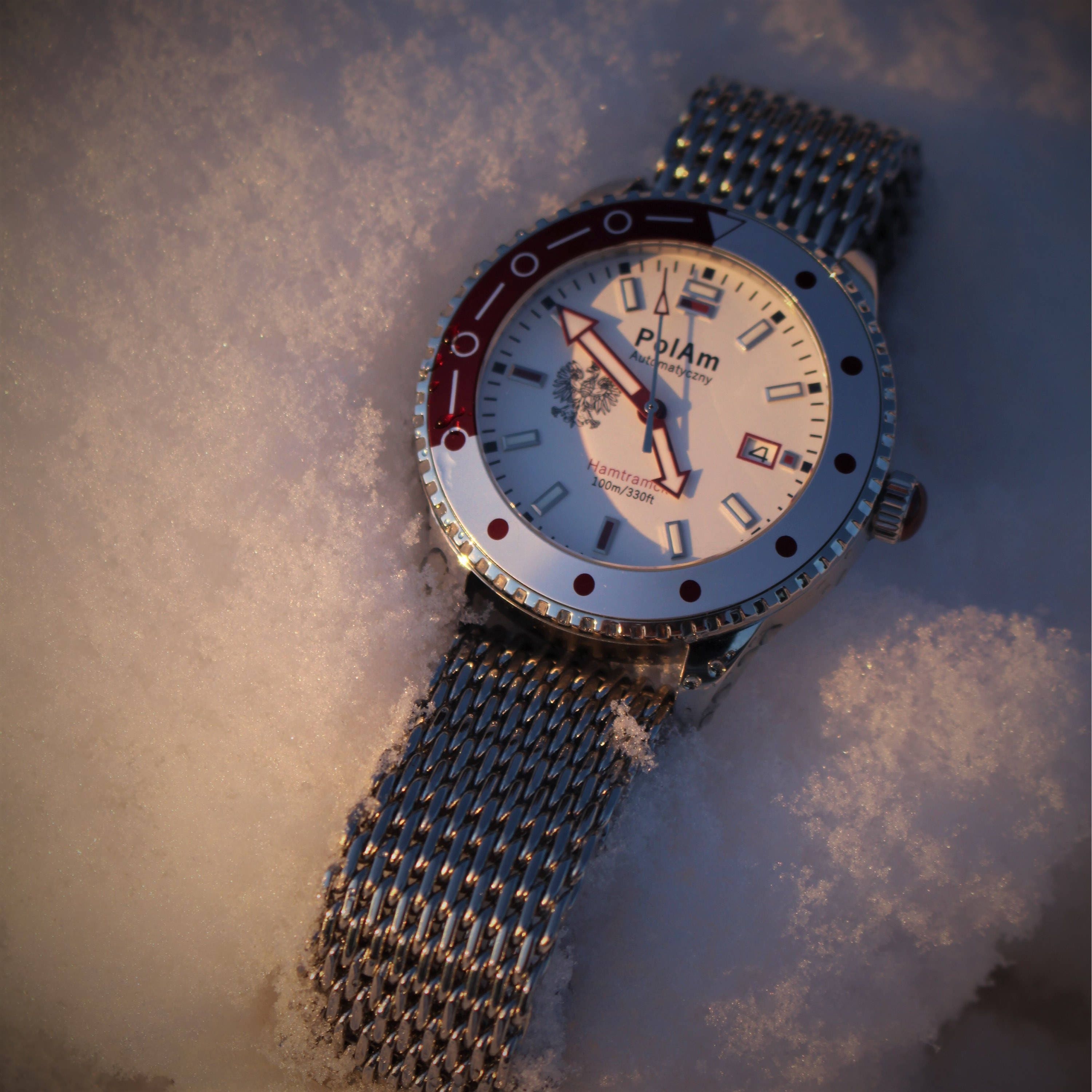 PolAm Hamtramck watch in snow showing shark mesh bracelet durability