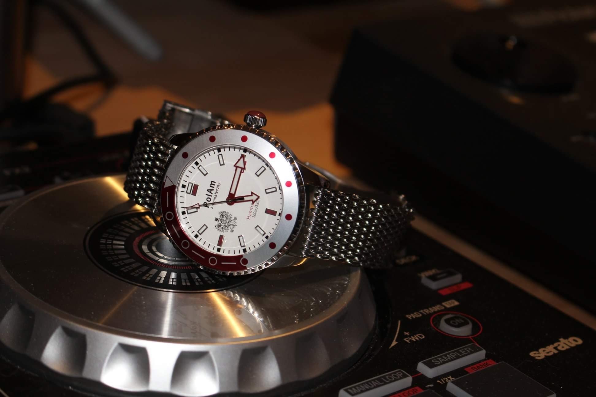 PolAm Hamtramck watch on DJ turntable with shark mesh bracelet - lifestyle shot